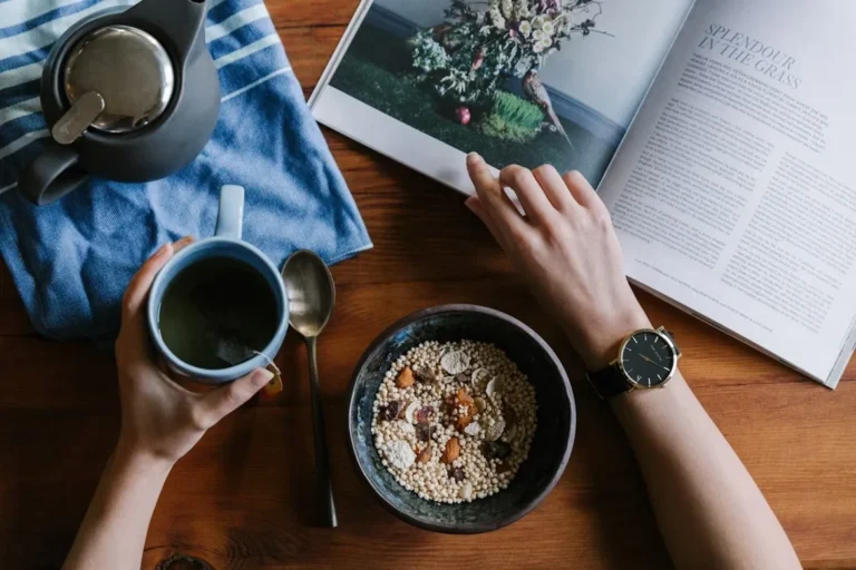 Calm morning routine with tea, breakfast, and a magazine — the daily rhythm a Long Covid memory app helps support